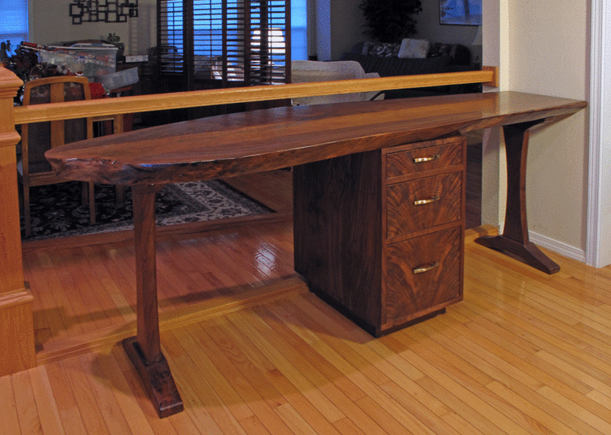 Photo of long walnut slab desk and cabinet